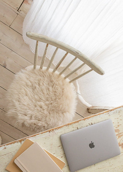 Luxury 100% sheepskin seat cover in ivory, soft and cosy, adds warmth and comfort to any chair