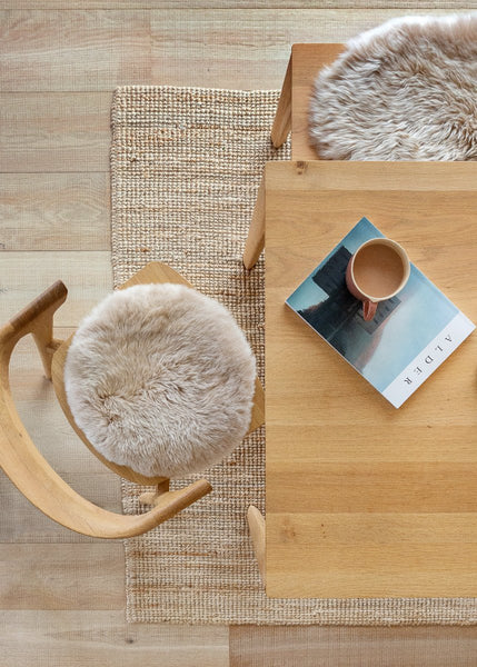 Luxury Nappa sheepskin seat pad in natural tone, with inner foam cushion and non-slip microfibre base