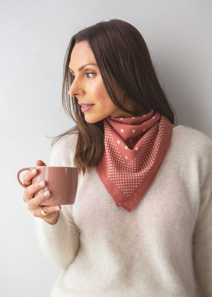 Handmade Indian Organic Cotton Block Printed Pink Bandana, styled as a neck scarf