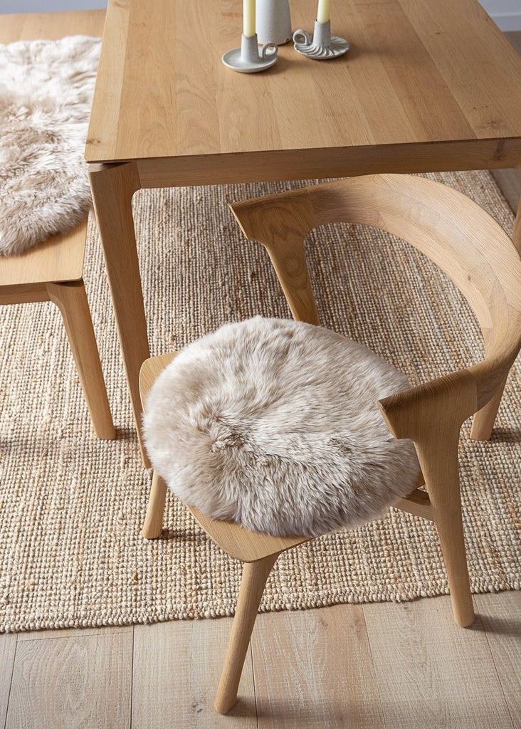 Luxury Nappa sheepskin seat pad in natural tone, with inner foam cushion and non-slip microfibre base