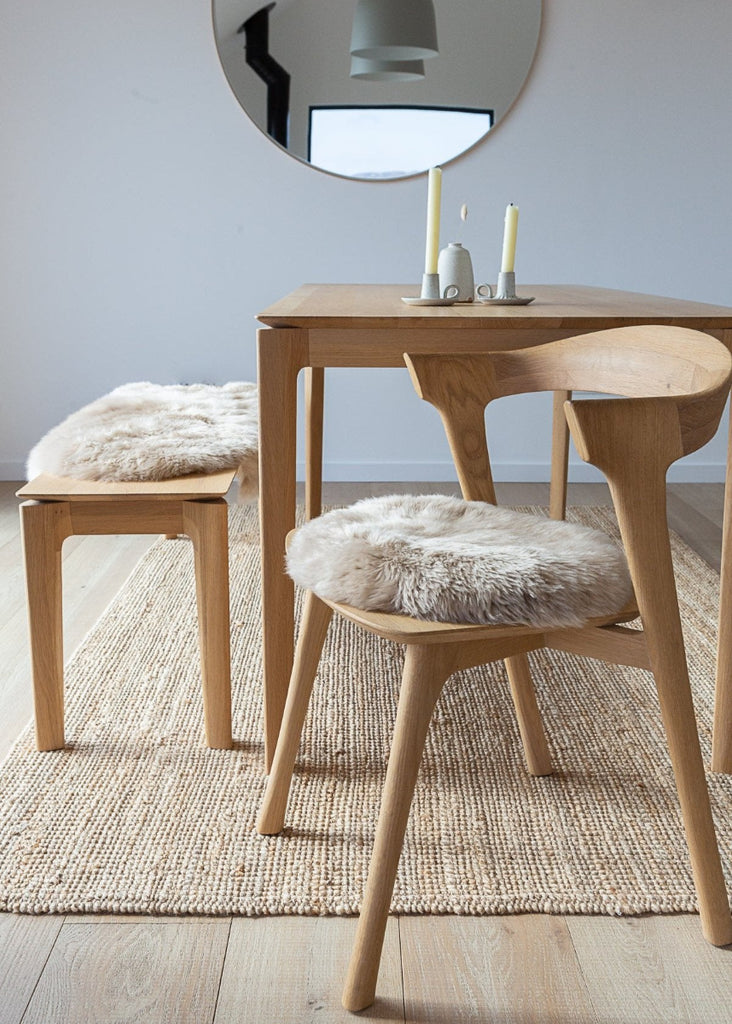 Luxury Nappa sheepskin seat pad in natural tone, with inner foam cushion and non-slip microfibre base