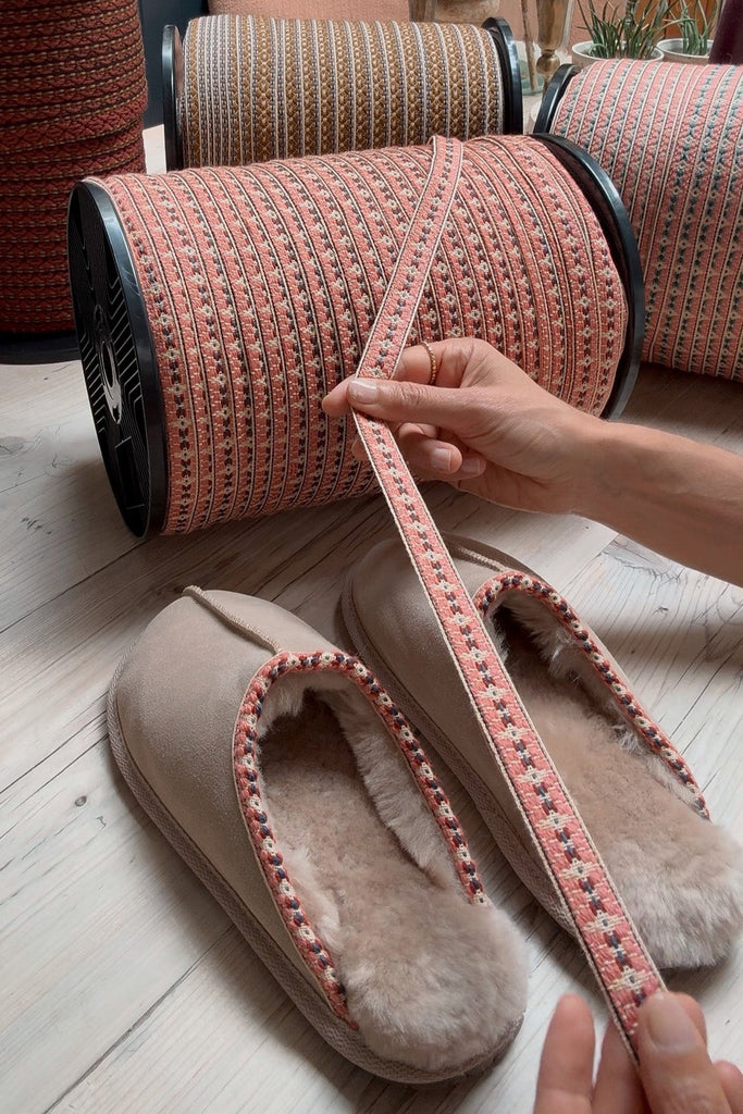 The trim that makes the slipper