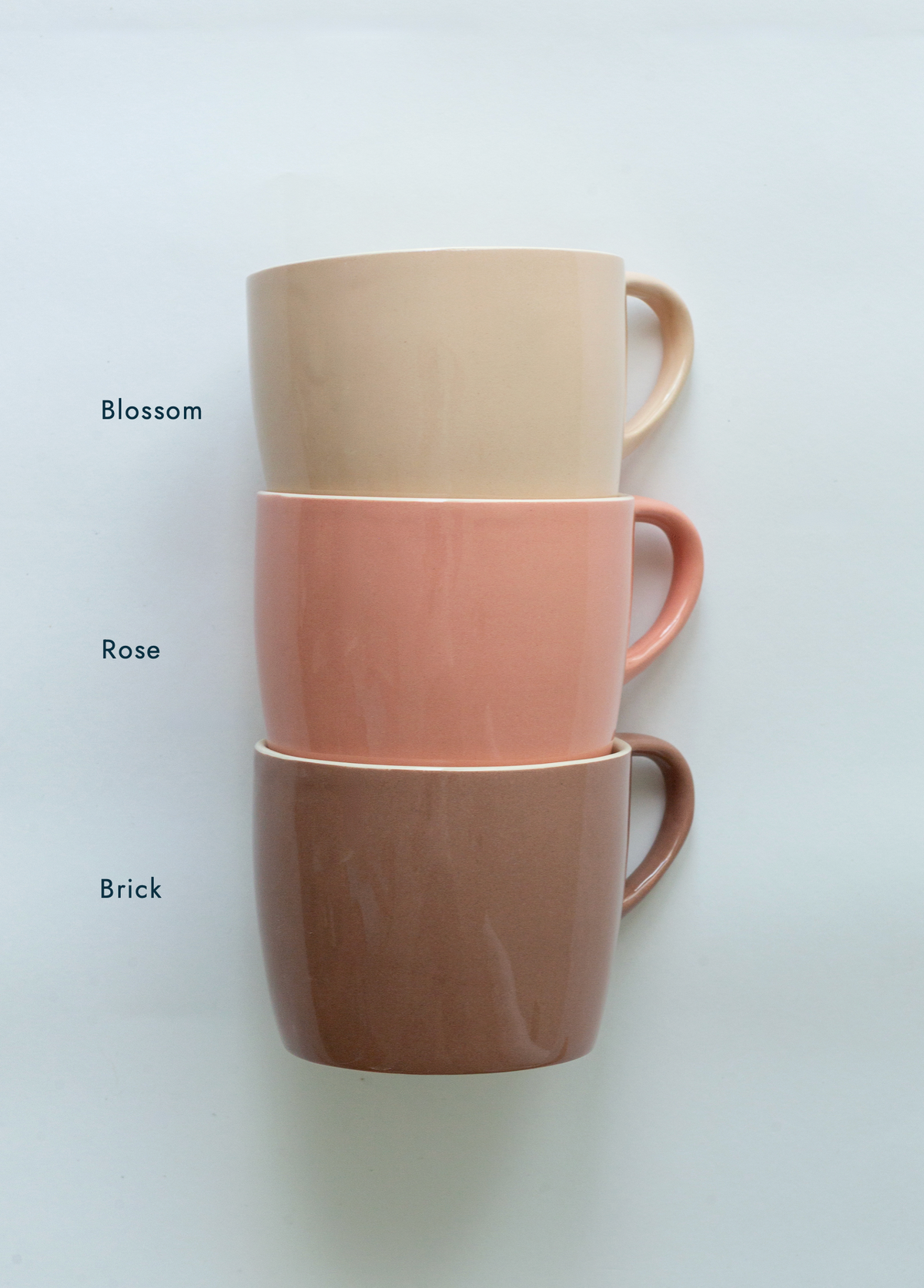 Brickett Davda Mugs