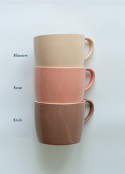Brickett Davda Mugs