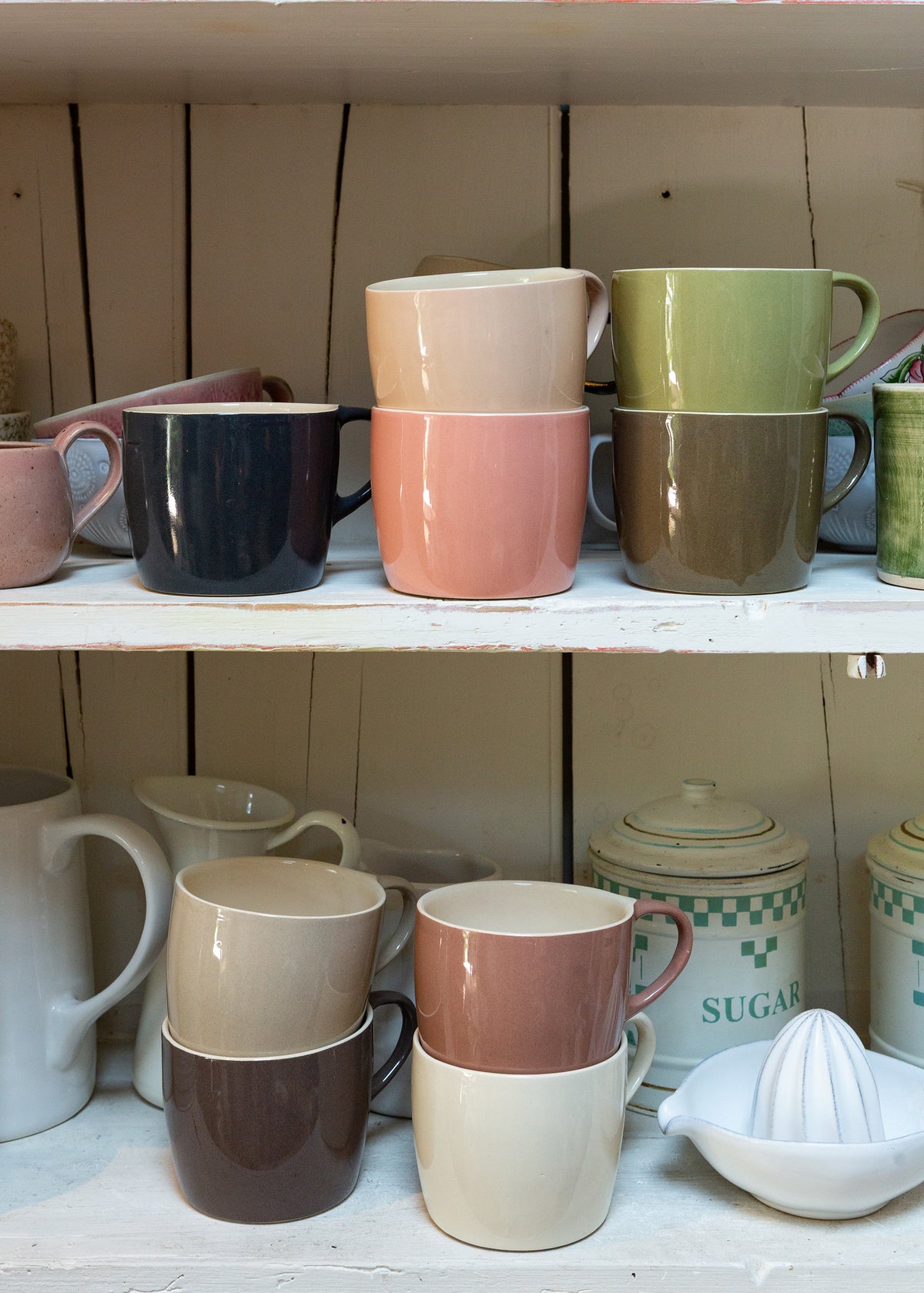 Brickett Davda Mugs