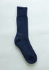 A single dark navy blue ribbed knit alpaca sock displayed vertically against a clean, light off-white background.