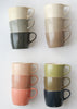 Brickett Davda Mugs