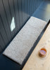 Natural short hair sheepskin bench pad in oatmeal with foam cushioning and non-slip microfibre base