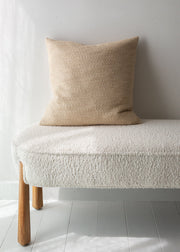 beige textured square cushion