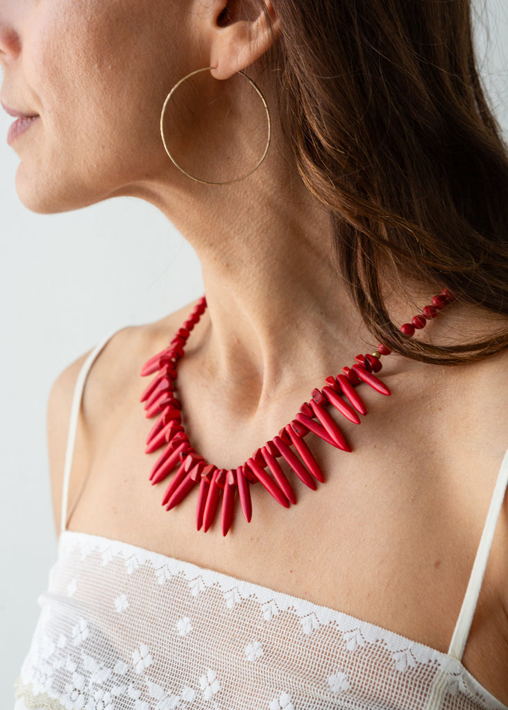 Red spiked stone necklace