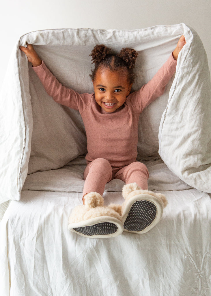 Cream children's slippers