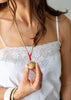 Brass Beaded Necklace with Shell Bell Pendant