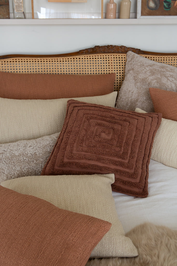 Slubby Cotton and tufted spiral cushions almond beige, mocha and clay pink 