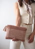 Blush pouch bag with tassels