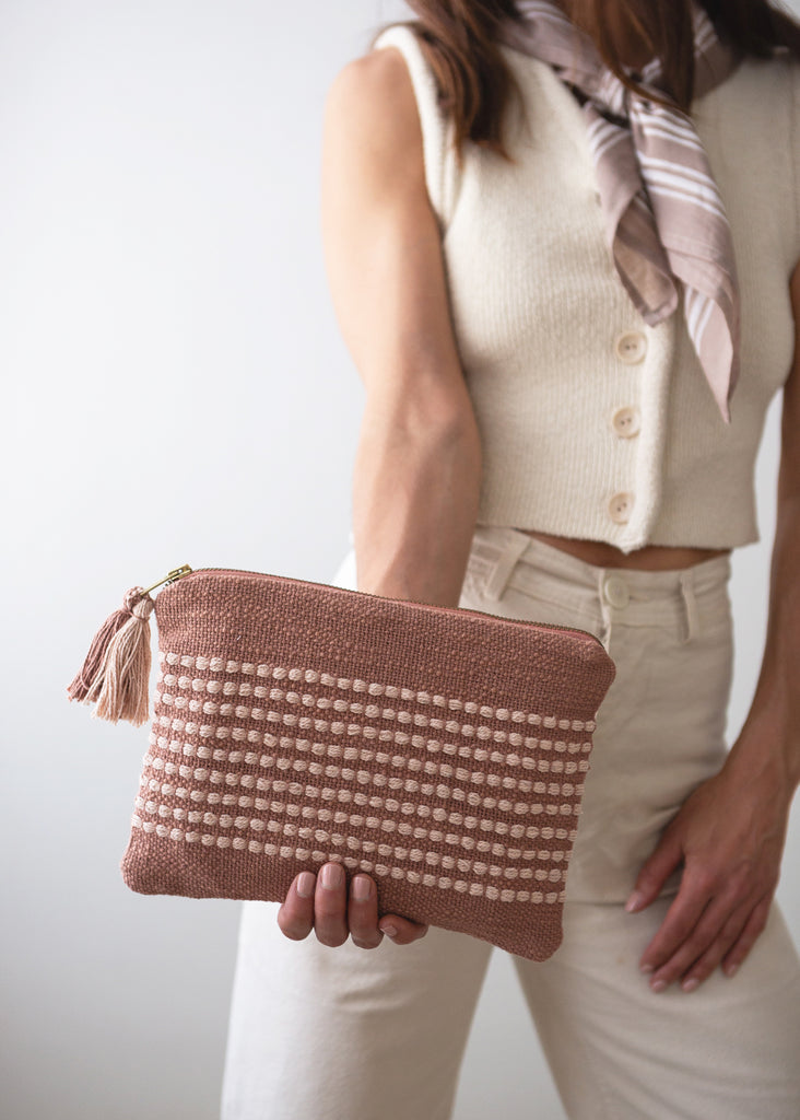 Blush pouch bag with tassels