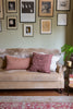 Small rectangular cushion in clay pink slubby cotton and Spiral tufted cushion in mocha linen 